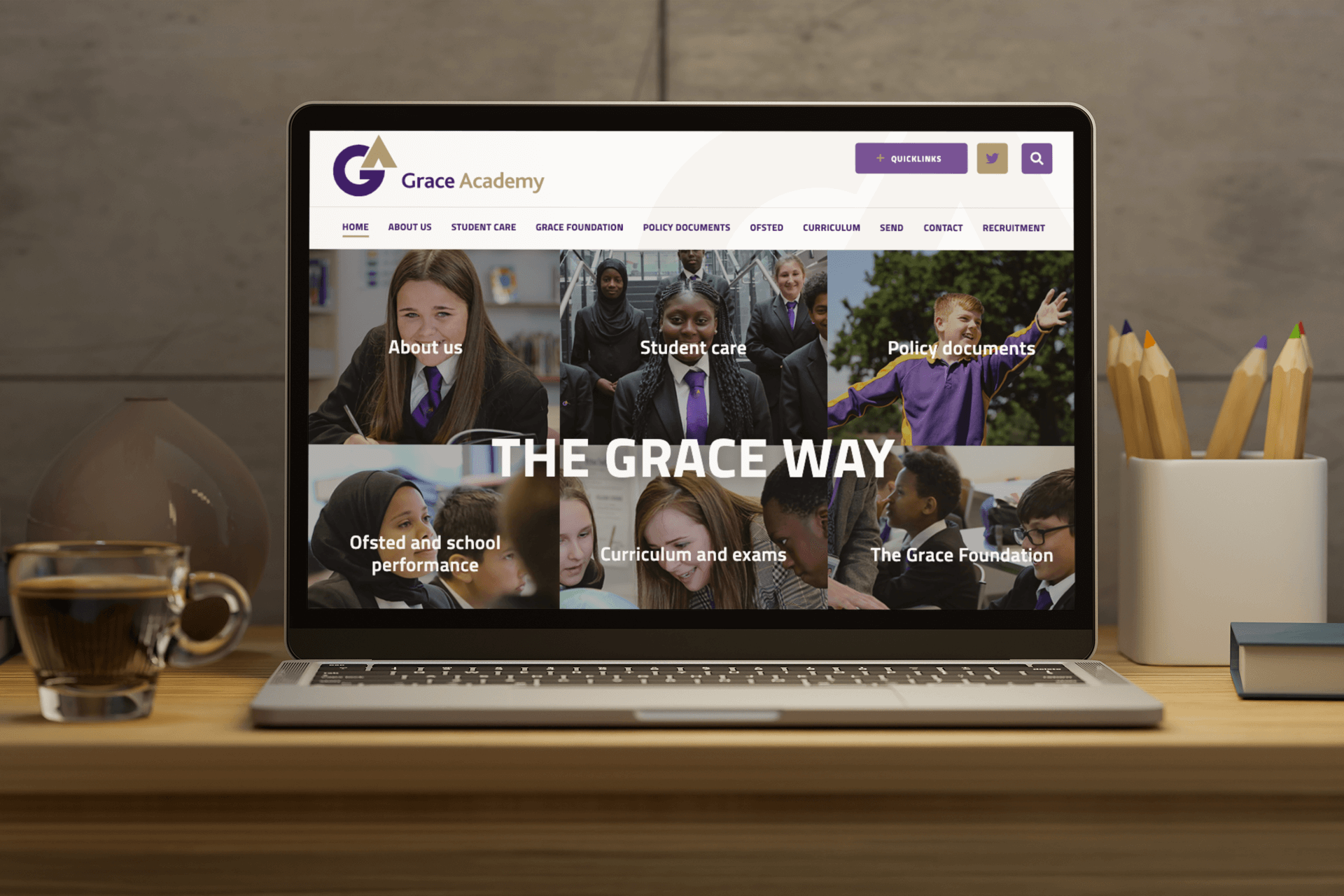 Grace Academy homepage on laptop